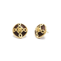 A subtle compass with a little berry at center, these teak stud earrings are substantial and supremely elegant. Trust your instincts and follow your own true north, your inner light. Let your conscience chart your course and you will always choose wisely.