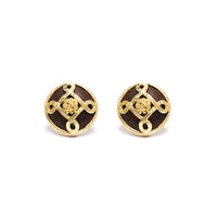Gold and teak clip earrings.