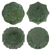 Four green plates on a white background