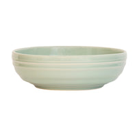 From our Bilbao Collection - A tour-de-force in modern tableware, this coupe bowl is translated beautifully in cozy curves, well-loved patina, and our fresh green hue. Serve up sumptuous amounts of your favorite grain bowl, fresh pasta, or seasonal salad.