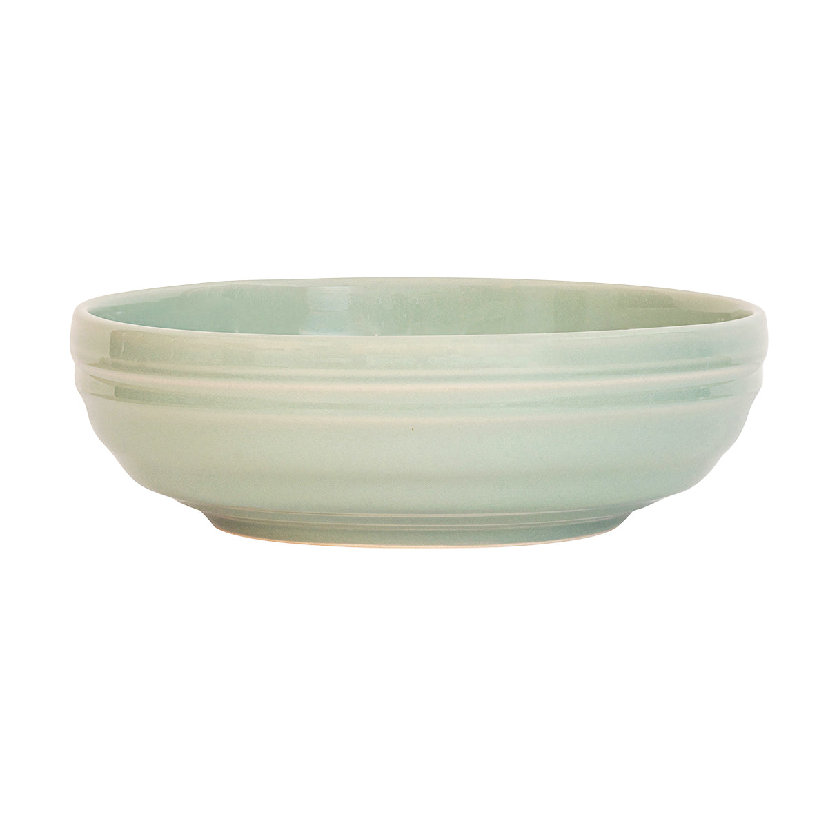 From our Bilbao Collection - A tour-de-force in modern tableware, this coupe bowl is translated beautifully in cozy curves, well-loved patina, and our fresh green hue. Serve up sumptuous amounts of your favorite grain bowl, fresh pasta, or seasonal salad.