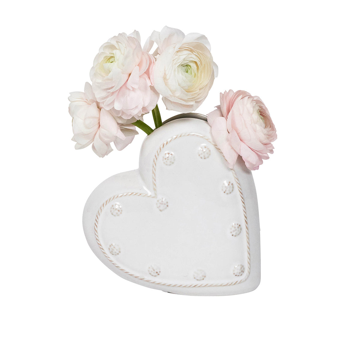 Heart-shaped white vase with pink flowers on a white background