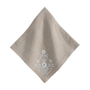 Brown napkin with floral embroidery on a white background
