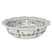 Decorative ceramic bowl with floral pattern on a white background