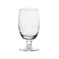 This gorgeous goblet has a hammered texture like dappled sunlight that causes anything you serve up - from water to ice cream floats to wine - to shimmer beautifully. What’s more, this mouth-blown glass is sturdy enough for everyday use, while the elegant footed silhouette ensures every drink feels a splash more special. 