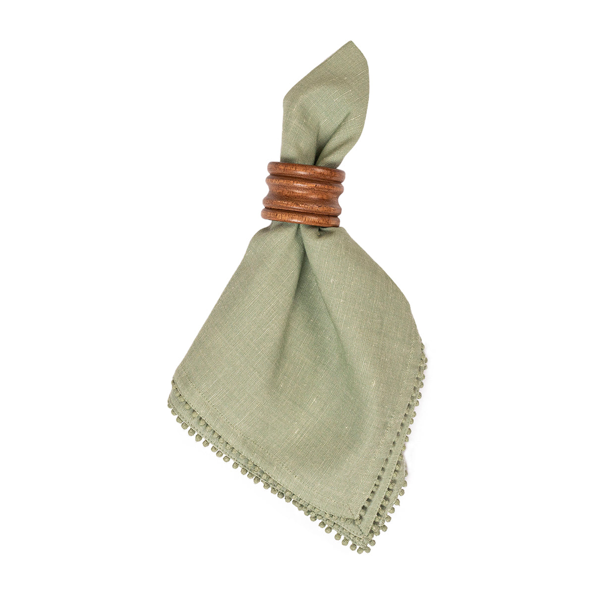 An olive green linen napkin with a knotted top and decorative pom-pom trim, secured with a brown woven band, shown on a plain white background.