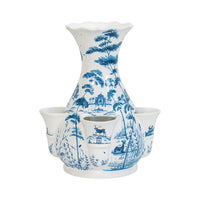 From our Country Estate Collection - Hopeless romantics, we have married our beautiful Delft blue vase with our stunning 17th-century-inspired Tulipiere to create this fabulous vessel that truly showcases flowers to their very best. The central vase is ideal for bunches and bouquets, while the individual receptacles at the base of the Tulipiere are for spotlighting single stems. The result is a blossoming sculpture - depicting idyllic scenes of the flora and fauna of our beloved Country Estate - and is fit 