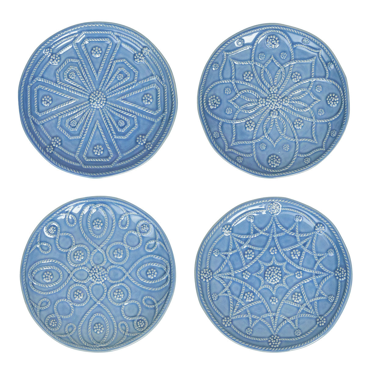 Four blue ceramic plates with decorative patterns on a white background