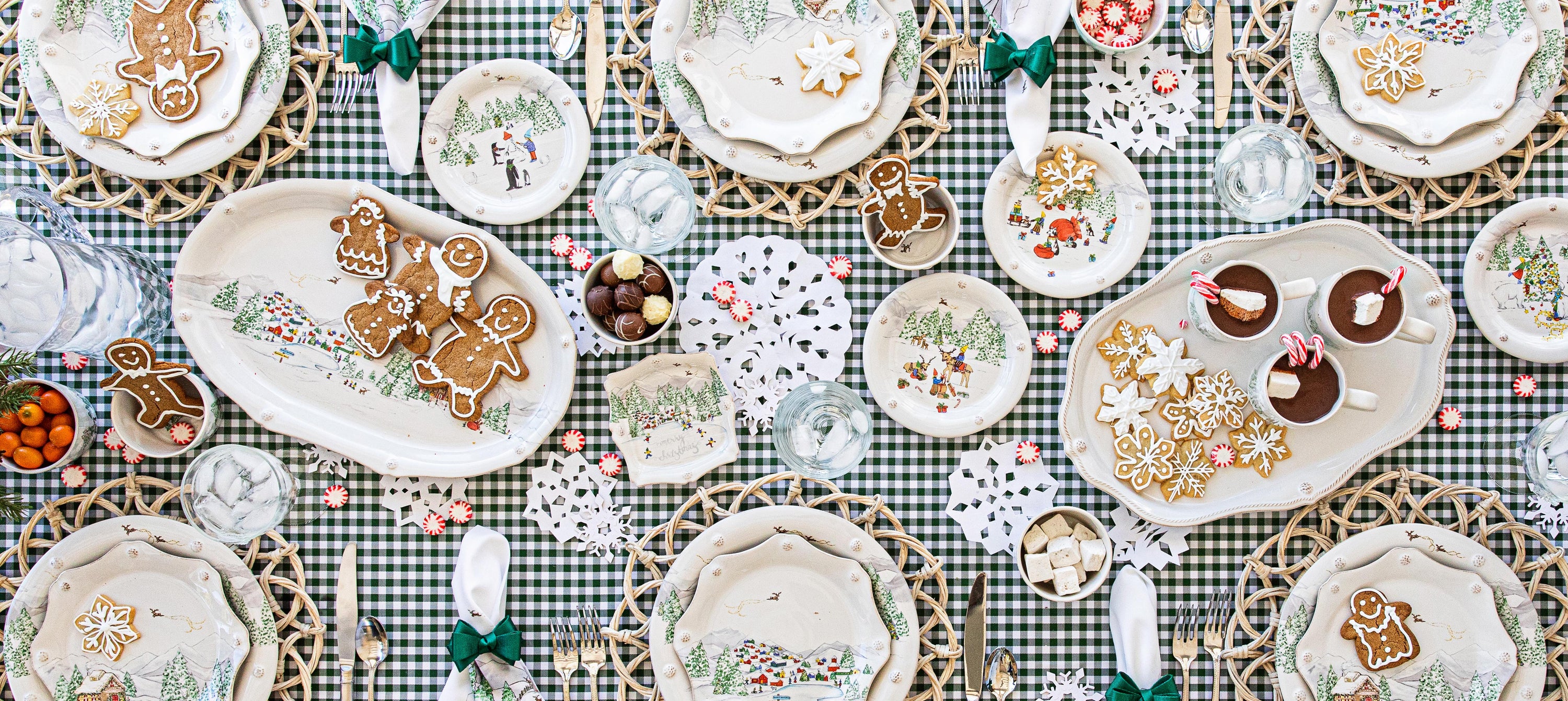 Berry & Thread North Pole collection on top of a green and white checked table.