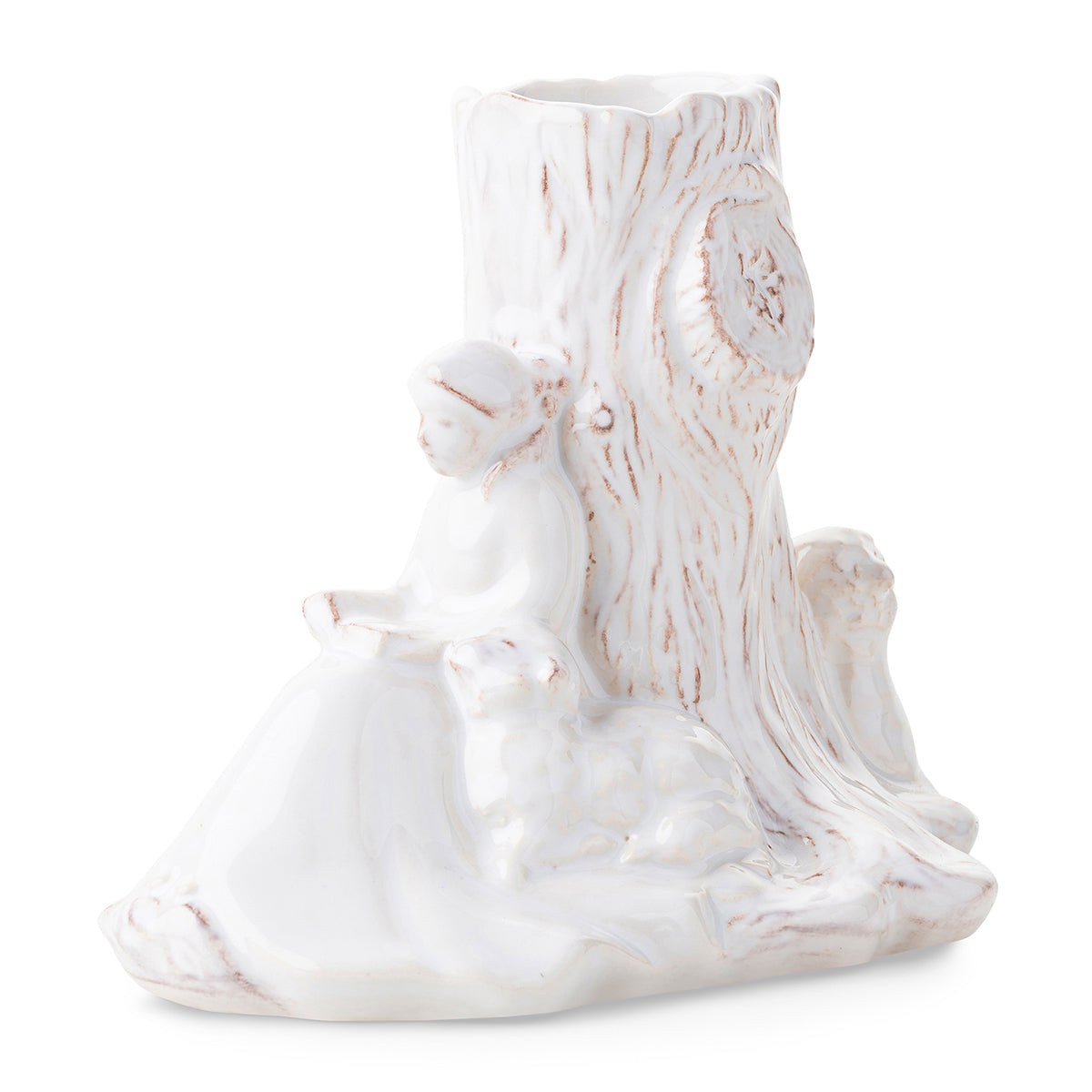 From our new Clever Creatures collection - this darling bud vase depicts an idyllic scene of a young girl reading in the countryside with a young lamb companion. Fill with a handful of wildflowers or colorful stems from your garden and place on a bedside table, bookshelf or down a mantle for a little touch of whimsy.