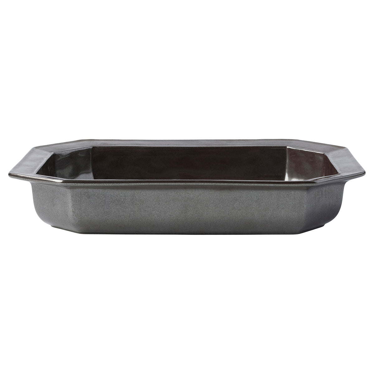 A rectangular dark gray cast iron baking pan with a hammered finish and flared corners, shown from a front-three-quarters angle on a solid white background.