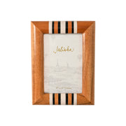 Wooden photo frame with striped design on a white background