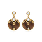 These alluring earrings are a paradoxical pairing of lustrous pearls and hand-carved teak wood accented with tiny crystals. These are stunning when paired with our Elizabetta Pearl Necklace or any of our other teak wood necklaces.  