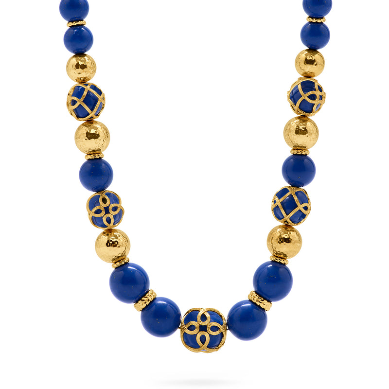Elizabetta Cage bead necklace made with gold and lapis.