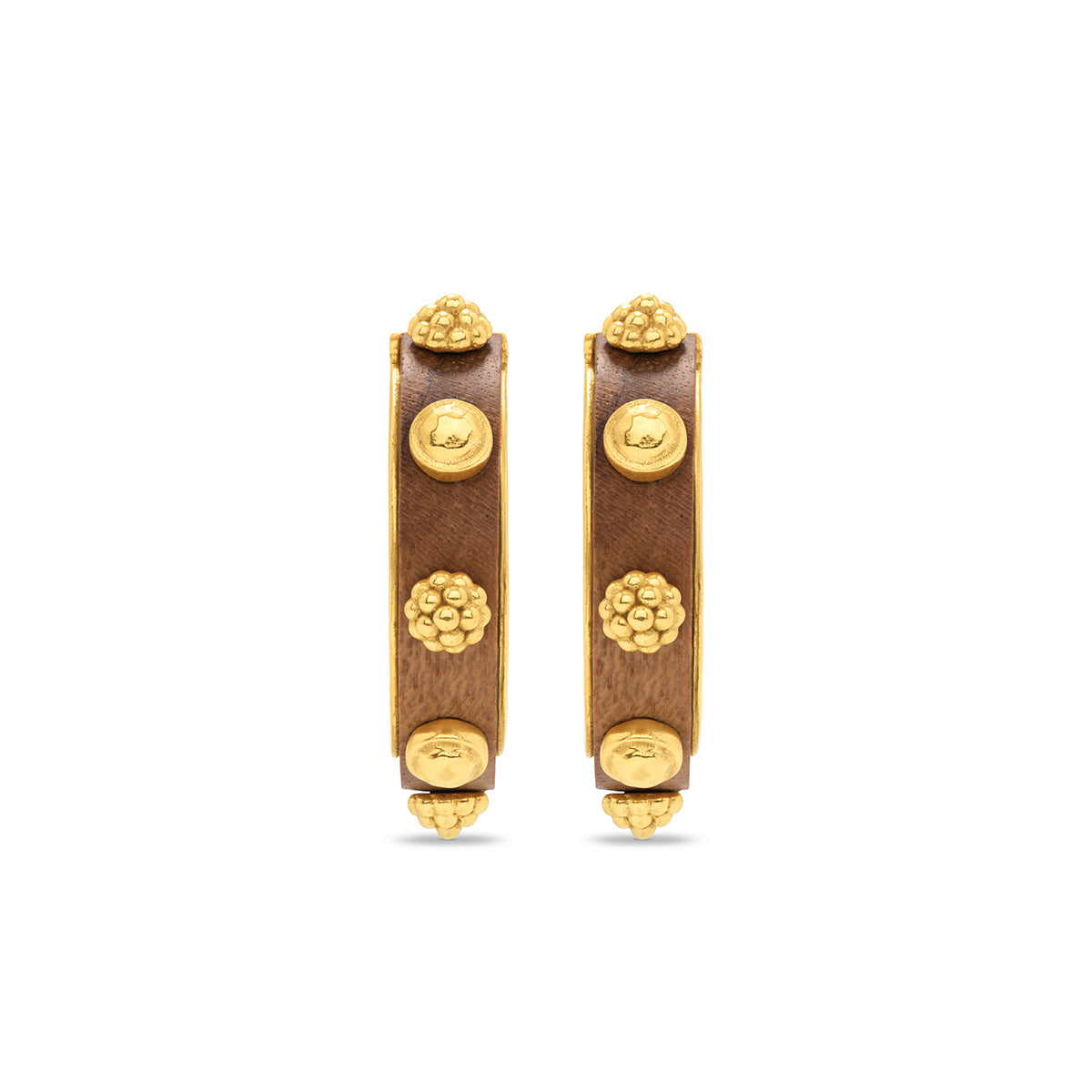 Pair of gold hoop earrings with wooden accents on a white background