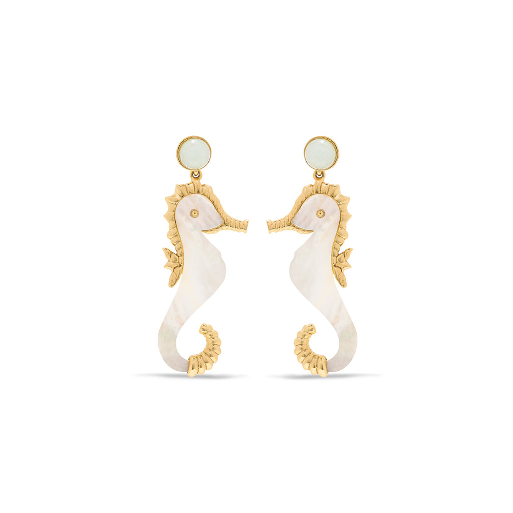 Earrings shaped like seahorses, made with gold and mother of pearl.