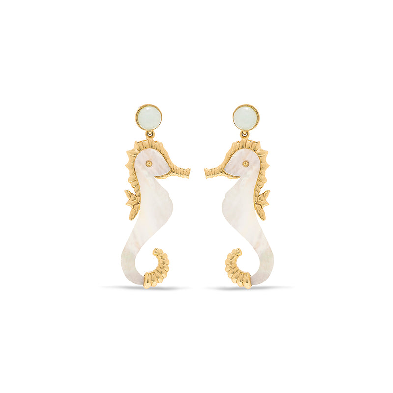 Earrings shaped like seahorses, made with gold and mother of pearl.