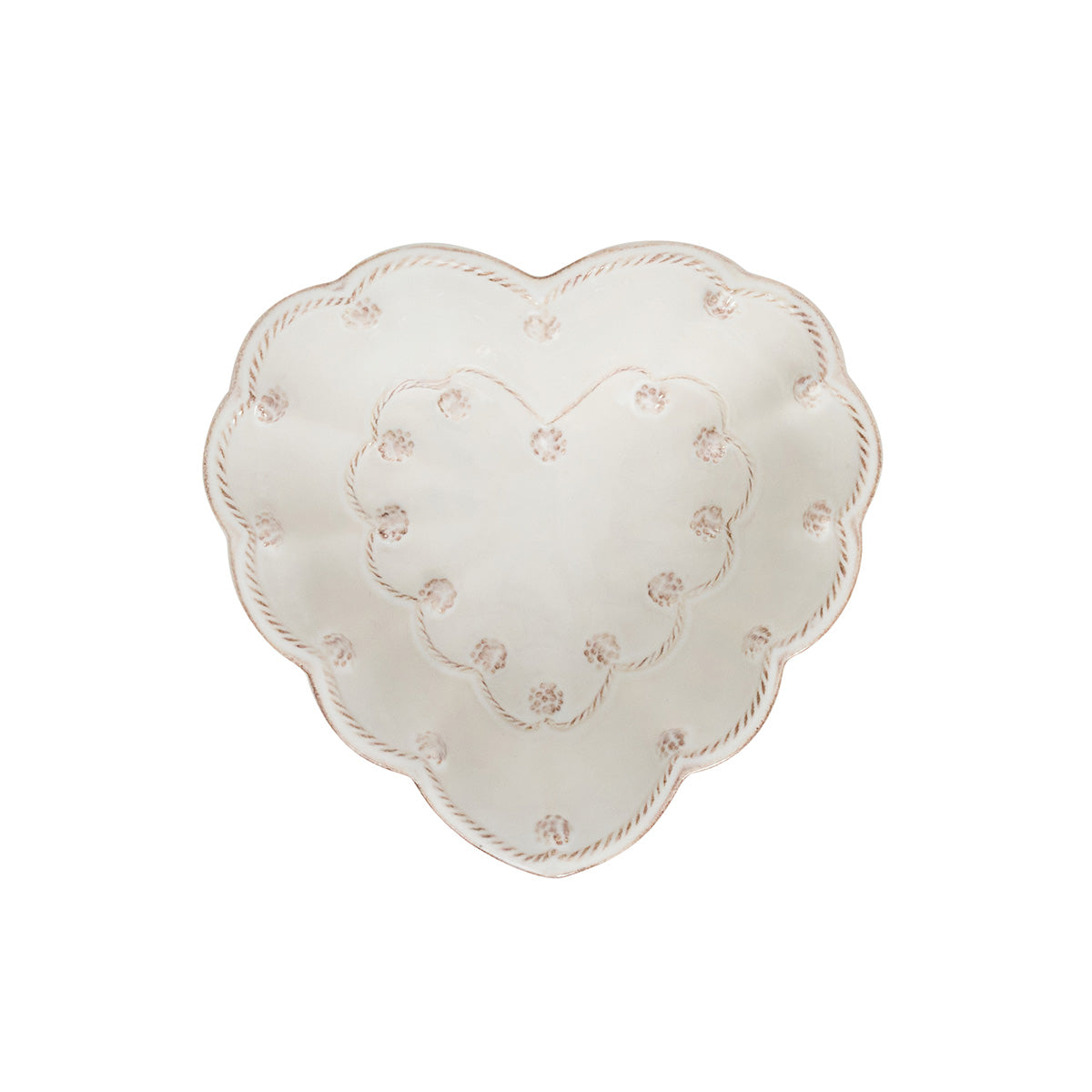 Heart-shaped decorative plate with floral patterns on a white background