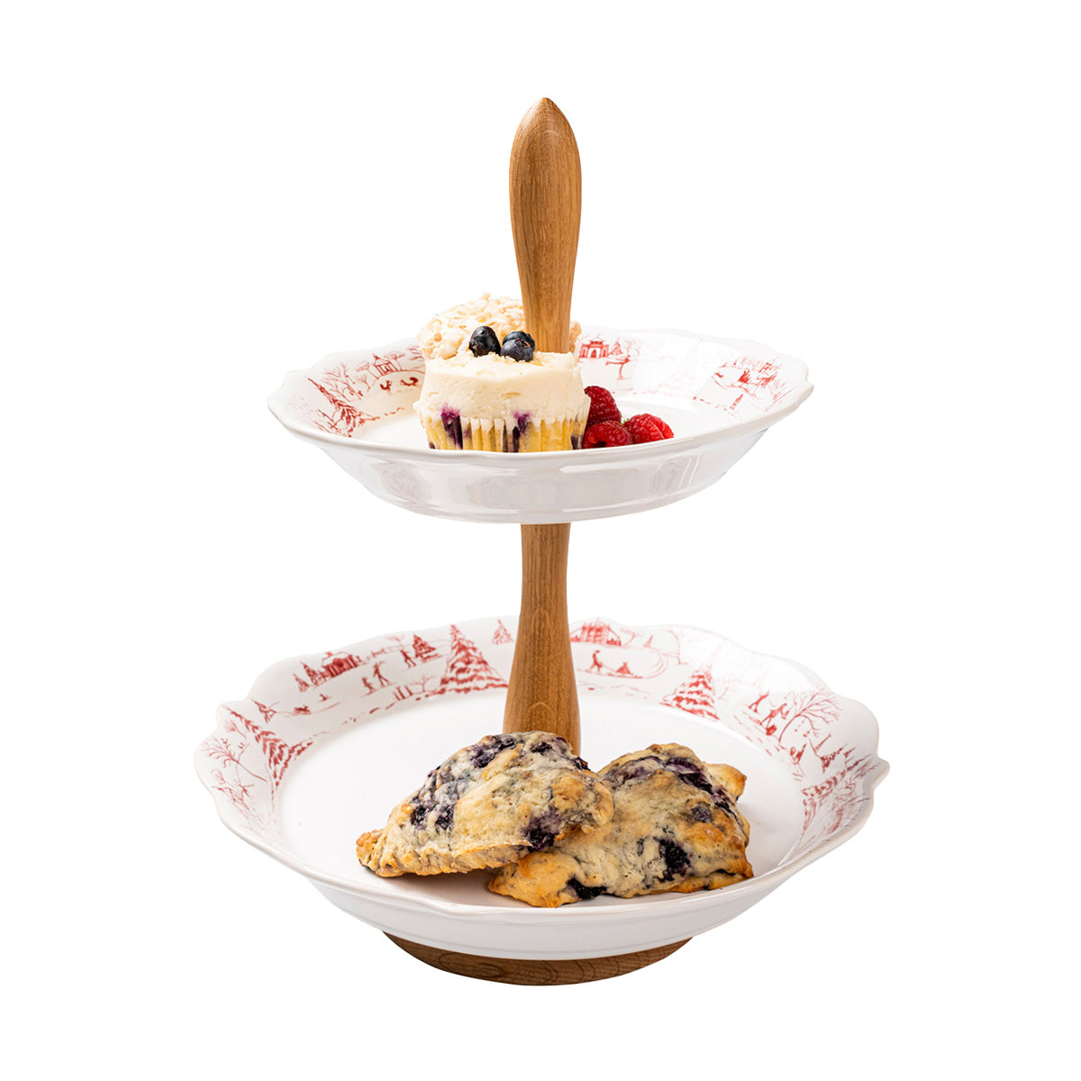 Two-tiered serving tray with desserts on a white background