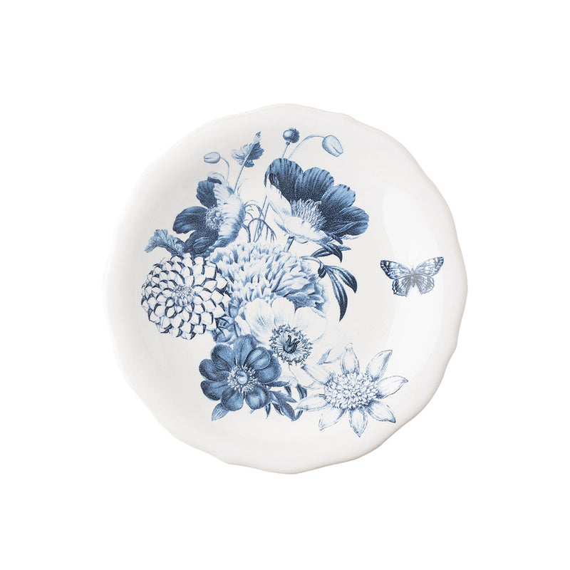 Festooned with a burst of elegant florals and a single butterfly, in soft shades of chambray blue, this dish is perfectly sized for nibbles and sides. The subtly scalloped rim gives it a feminine silhouette that makes it equally lovely as a layering piece or on its own. 