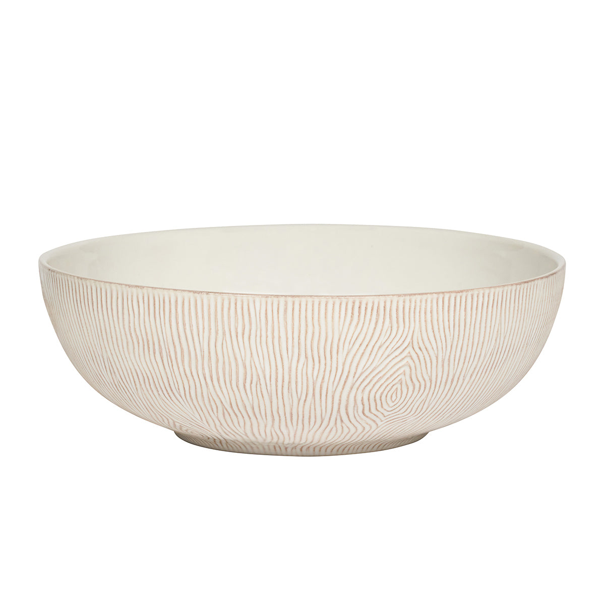Beige ceramic bowl with textured surface on a white background