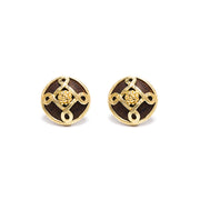 Gold and teak clip earrings.