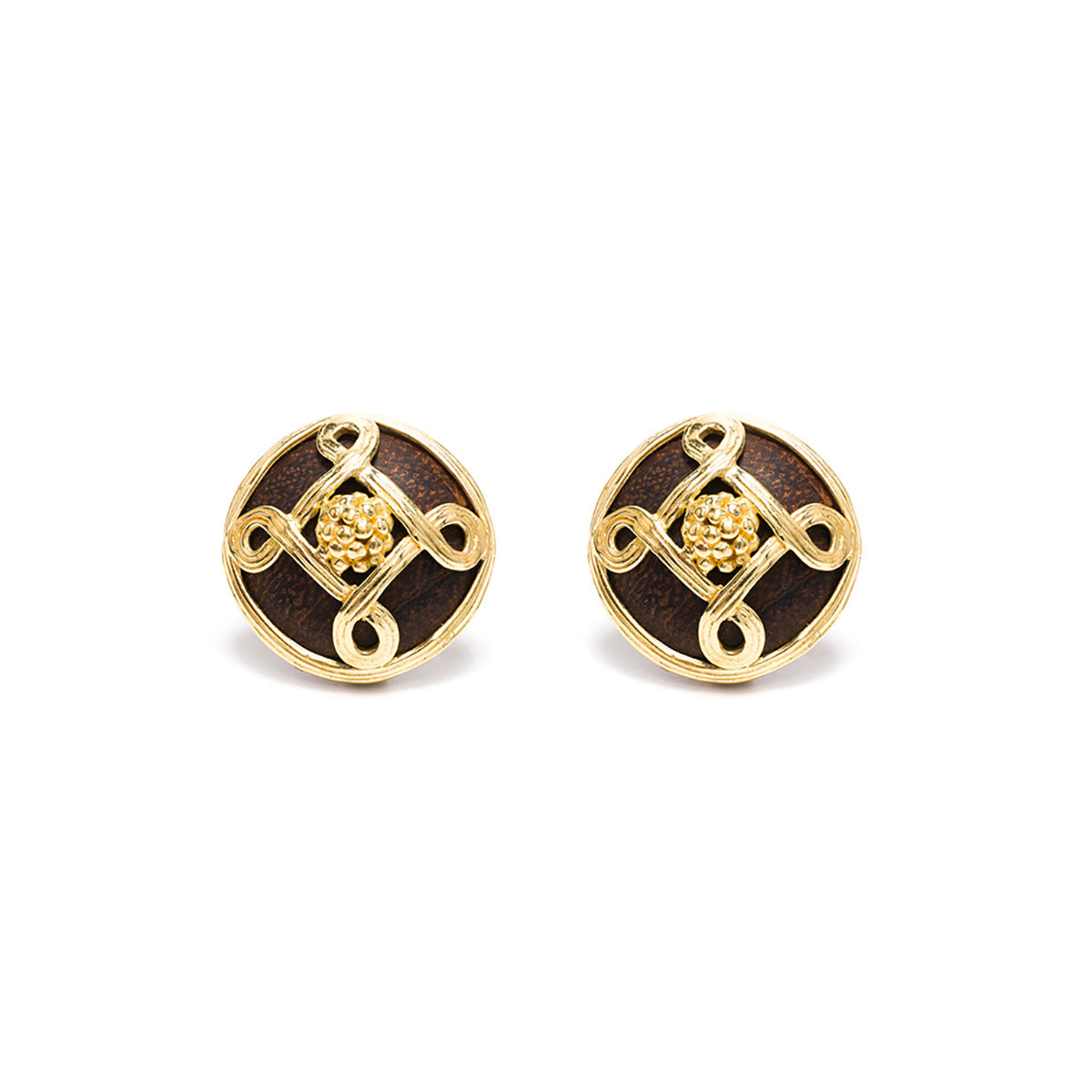 Gold and teak clip earrings.