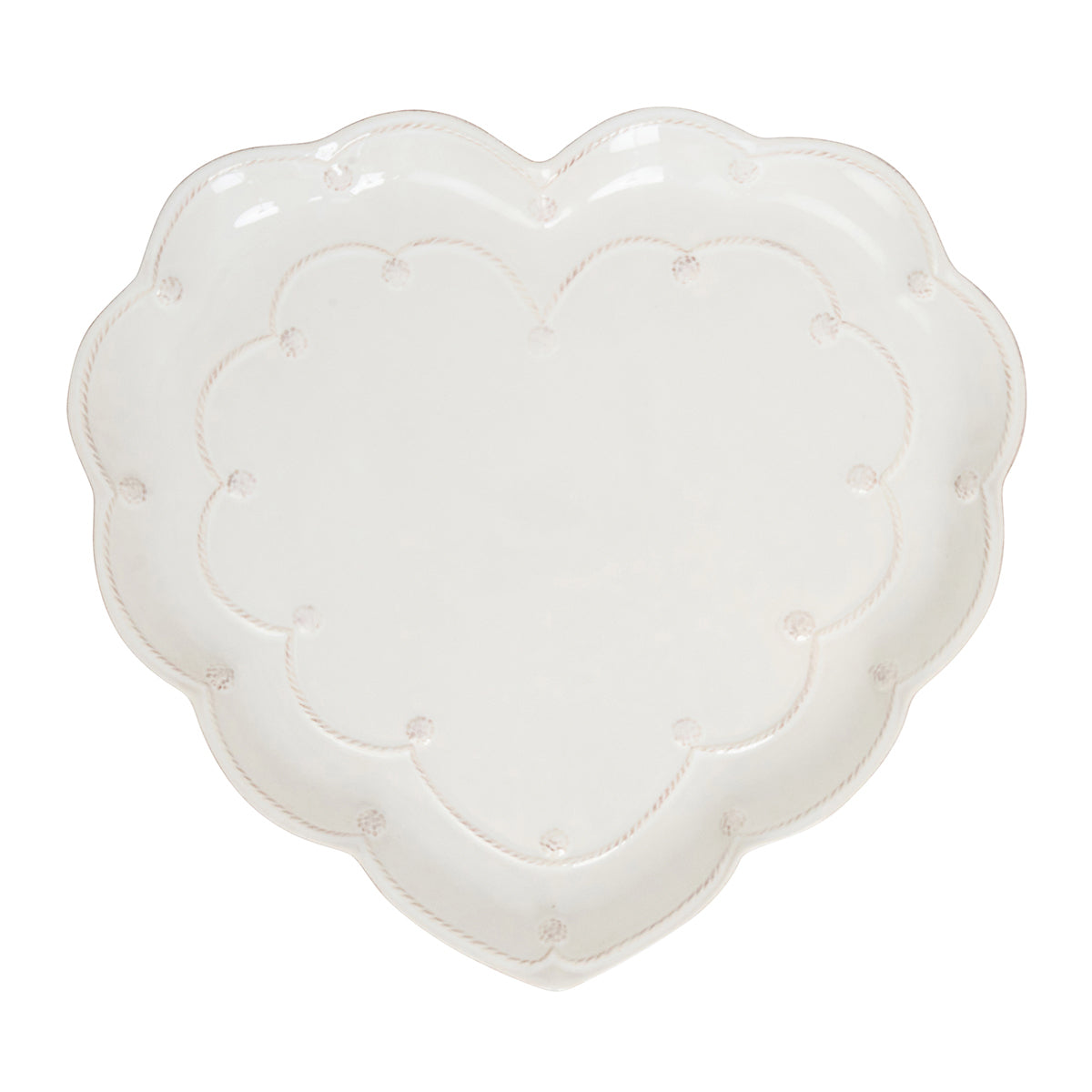 White heart-shaped cushion on a white background