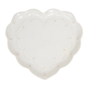 White heart-shaped cushion on a white background