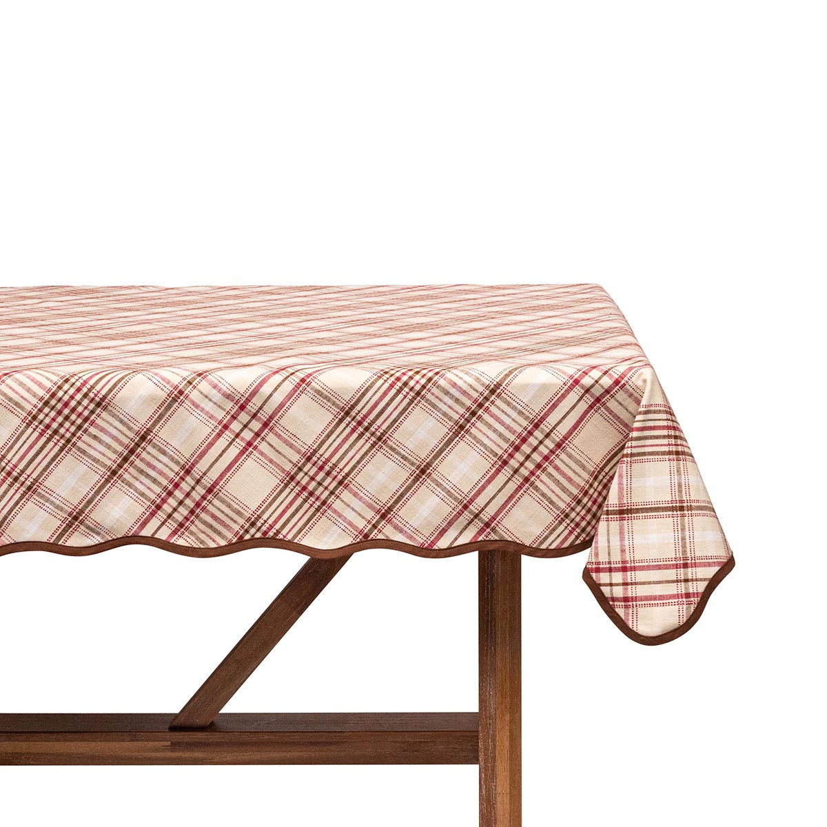 Plaid tablecloth on a wooden table with a white background