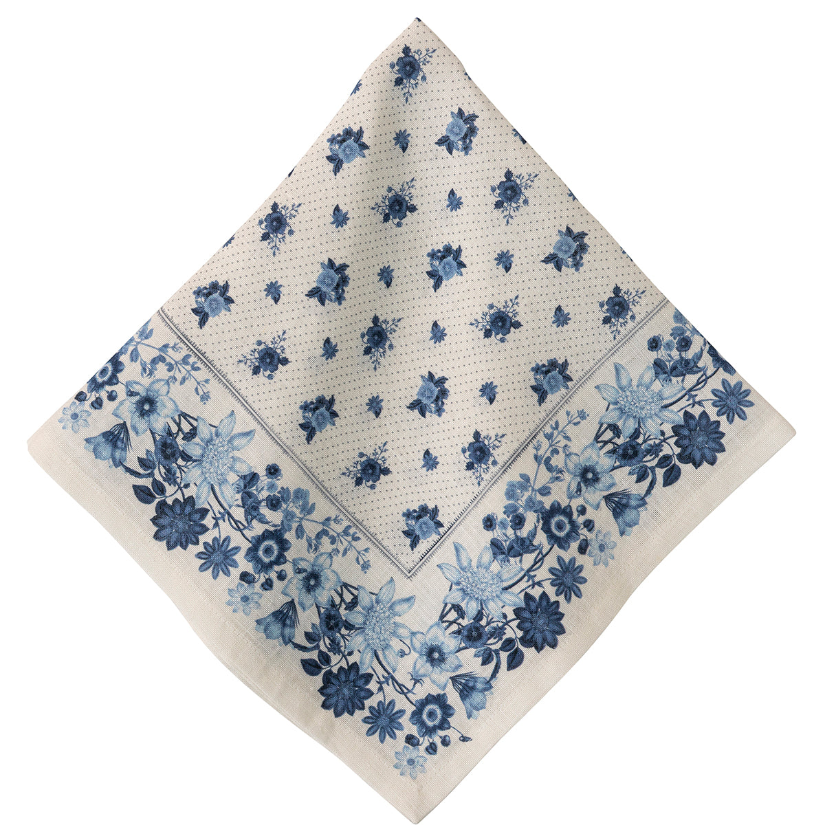 A square cream-colored napkin with a blue floral pattern and a dotted border, displayed diagonally on a white background.