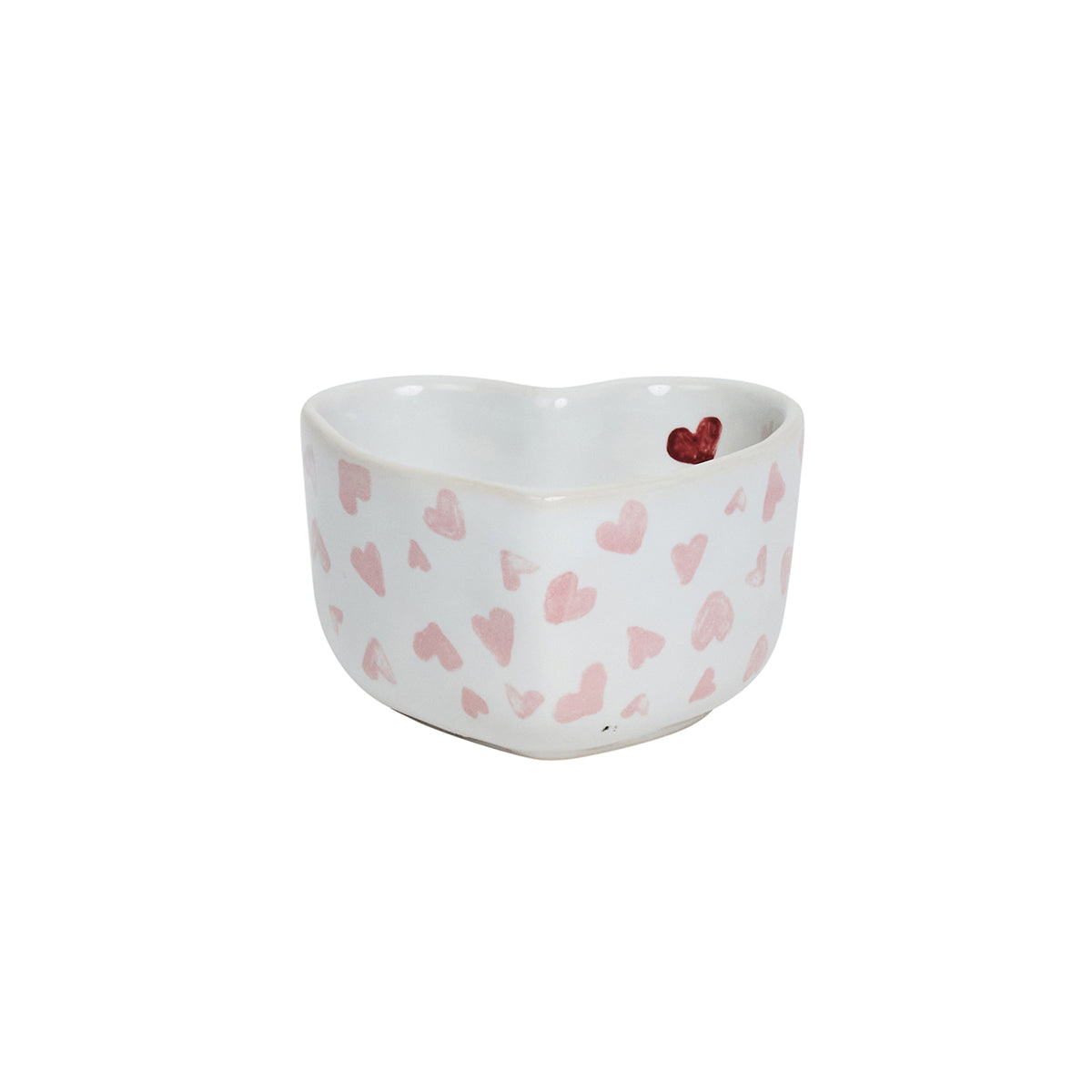 Heart-shaped ceramic bowl with pink heart patterns on a white background