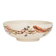 Beige bowl with nature-themed design on a white background
