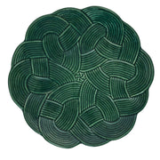 Green braided plate on a white background