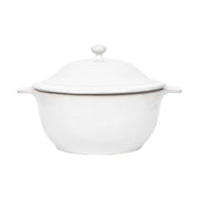 White ceramic casserole dish with lid on a white background