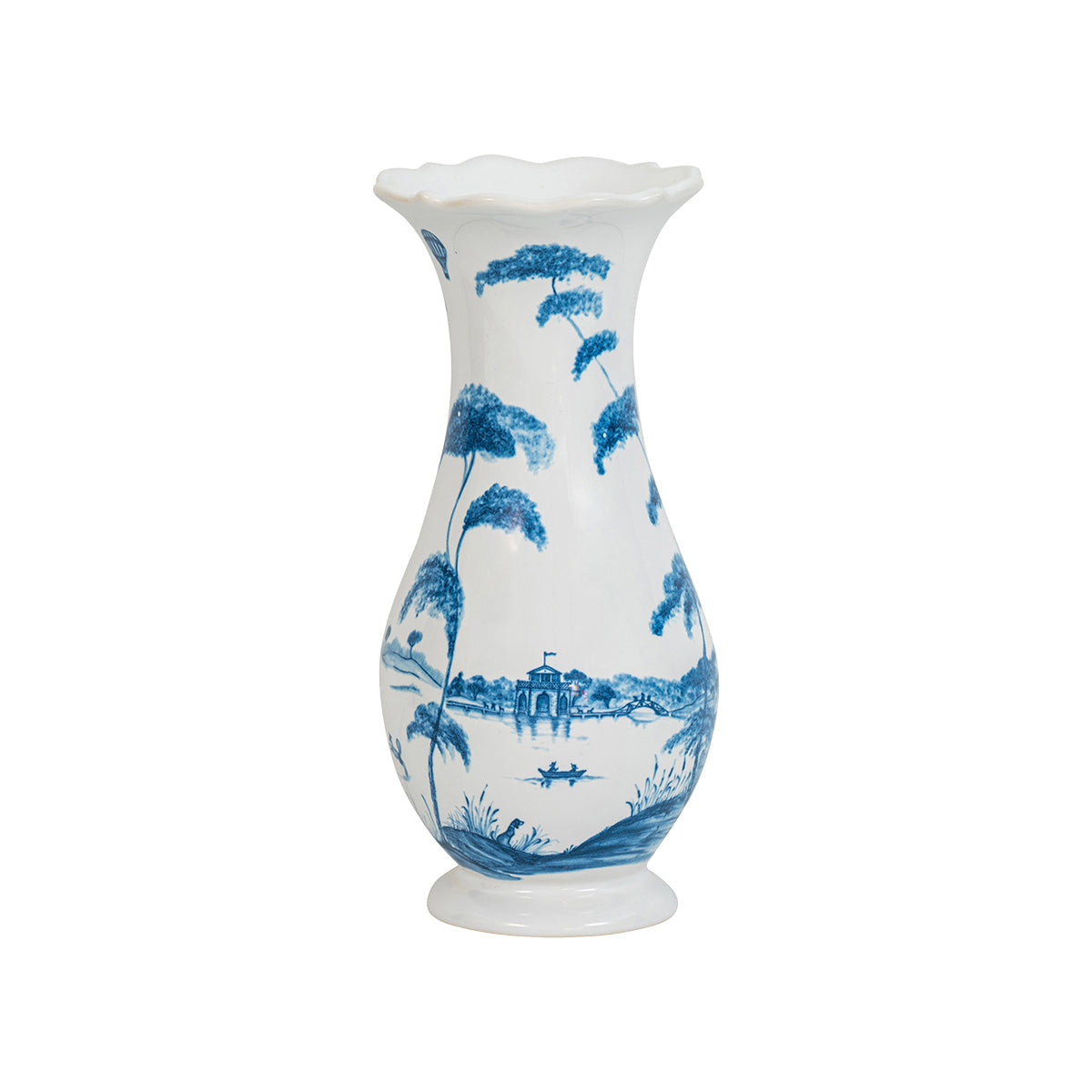From our Country Estate Collection - Our modernized version of classic 17th century Delftware from Holland, our hand-painted motif illustrates idyllic scenes from our fanciful Country Estate. The classic pairing of blue and white is eternally crisp and chic and can easily float between casual everyday charm and upscale elegance. With a scallop rim and dreamy depiction of the boat house and other lakeside pursuits, this vase makes a lovely accent piece wherever it resides - with or without flowers. What’s mo