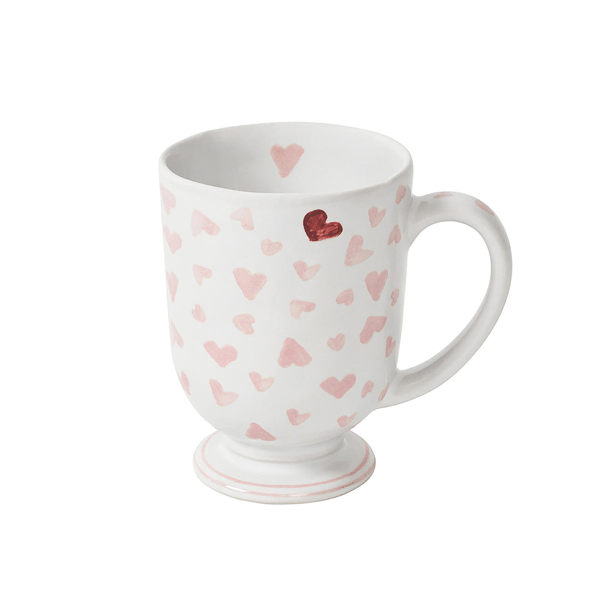 White mug with pink heart pattern on a white background